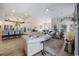 Open concept living room that flows into the kitchen, features a fireplace and modern design at 2300 Lark Sparrow St., Myrtle Beach, SC 29577