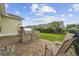 Beautiful outdoor patio with a built-in grill, comfortable seating, and a scenic backyard view at 2300 Lark Sparrow St., Myrtle Beach, SC 29577