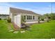 This backyard has a beautiful patio area with a privacy fence, a well-manicured lawn, and some mature landscaping at 231 Marbella Dr., Murrells Inlet, SC 29576