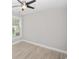 Neutral-toned bedroom with modern ceiling fan and natural light at 231 Marbella Dr., Murrells Inlet, SC 29576