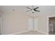 Bedroom featuring a ceiling fan and bathroom with a modern vanity and tile at 231 Marbella Dr., Murrells Inlet, SC 29576