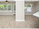 Spacious living area featuring tile floors, neutral walls, and an open layout with ample natural light at 231 Marbella Dr., Murrells Inlet, SC 29576