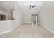 Spacious open-concept living area featuring tile floors and an entryway view at 231 Marbella Dr., Murrells Inlet, SC 29576
