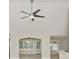 Bright living room boasting a ceiling fan, plenty of natural light, and an open-concept design at 231 Marbella Dr., Murrells Inlet, SC 29576