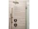 Close up of a shower featuring a handheld showerhead and stone-look tile at 231 Marbella Dr., Murrells Inlet, SC 29576