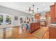 Spacious kitchen featuring a central island, stainless steel appliances, and hardwood floors at 2382 Waverly Rd., Pawleys Island, SC 29585