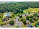 Aerial view shows neighborhood pool, parking, playground, sports fields and community spaces at 2448 Whetstone Ln., Myrtle Beach, SC 29579