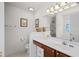 Bright bathroom featuring a vanity with modern fixtures and a shower at 2448 Whetstone Ln., Myrtle Beach, SC 29579