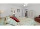 Bedroom featuring a floral bedspread, and neutral decor, offering a relaxing retreat at 2448 Whetstone Ln., Myrtle Beach, SC 29579