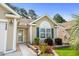 Charming front entrance with beautiful landscaping and a welcoming walkway at 2448 Whetstone Ln., Myrtle Beach, SC 29579