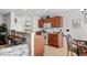 Kitchen featuring breakfast bar with modern appliances and wood cabinets at 2448 Whetstone Ln., Myrtle Beach, SC 29579