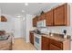 Well-lit kitchen with white appliances, including electric stove and microwave at 2448 Whetstone Ln., Myrtle Beach, SC 29579