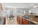 Charming kitchen features a sink, and breakfast area with a chandelier and natural light at 2448 Whetstone Ln., Myrtle Beach, SC 29579