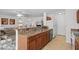 Kitchen with breakfast bar overlooking the living room with stainless steel dishwasher at 2448 Whetstone Ln., Myrtle Beach, SC 29579