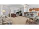 Open concept living room with breakfast bar and comfortable seating area at 2448 Whetstone Ln., Myrtle Beach, SC 29579