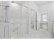 Modern bathroom features a walk-in tub, marble tile shower, and a toilet in a separate room at 2475 Blue Crane Circle # 106, Myrtle Beach, SC 29577