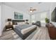 Beautiful main bedroom suite features stylish decor and natural light at 2475 Blue Crane Circle # 106, Myrtle Beach, SC 29577