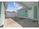 Covered patio with concrete flooring and a white door, ideal for outdoor relaxation at 2475 Blue Crane Circle # 106, Myrtle Beach, SC 29577