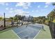 Fenced pickleball court with view of the community bath house at 2475 Blue Crane Circle # 106, Myrtle Beach, SC 29577