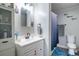 Bright bathroom with a fresh vanity, modern fixtures, tub and a decorative color scheme at 2510 Redwood St., Georgetown, SC 29440