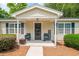 Welcoming front porch featuring comfortable seating and a 'Welcome' sign at 2510 Redwood St., Georgetown, SC 29440