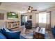 Inviting living room with a TV, ceiling fan, and comfortable furnishings at 2510 Redwood St., Georgetown, SC 29440