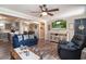 Comfortable living room with TV, ceiling fan, and access to dining and kitchen areas at 2510 Redwood St., Georgetown, SC 29440