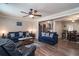Cozy living room with comfortable seating, open to the dining room and kitchen at 2510 Redwood St., Georgetown, SC 29440