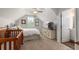 Cozy bedroom featuring a crib, bed with white bedding, and a dresser with a TV at 2609 Seaport Circle, Georgetown, SC 29440