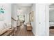 Bright entryway showcasing hardwood floors and stylish decor leading into an open living space at 2609 Seaport Circle, Georgetown, SC 29440