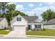 Charming single-Gathering home with a well-manicured lawn, two-car garage, and inviting curb appeal at 2609 Seaport Circle, Georgetown, SC 29440