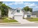 Charming single-Gathering home with a well-manicured lawn and an attached two-car garage at 2609 Seaport Circle, Georgetown, SC 29440