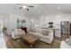 Spacious living area with comfortable seating, an open kitchen, and plenty of natural light at 2609 Seaport Circle, Georgetown, SC 29440