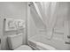 Clean bathroom featuring a white toilet, bathtub, and towel arrangement at 3000 N Ocean Blvd. N # 531, Myrtle Beach, SC 29577