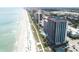 A captivating aerial view of a busy beach and hotels along the coastline at 3000 N Ocean Blvd. N # 708, Myrtle Beach, SC 29577