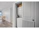 A compact laundry closet houses a stacked washer and dryer for added convenience at 3000 N Ocean Blvd. N # 708, Myrtle Beach, SC 29577