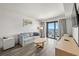 Bright living room space with modern furniture, ocean view at 3000 N Ocean Blvd. N # 708, Myrtle Beach, SC 29577