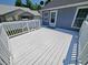Spacious back deck with white railings, offering a great view of the well-maintained backyard at 302 Silver Fox Trail, Myrtle Beach, SC 29588