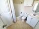 Well-maintained bathroom features a shower, vanity, and storage cabinet at 302 Silver Fox Trail, Myrtle Beach, SC 29588