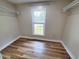 A closet with wood-grain flooring and built-in shelving at 302 Silver Fox Trail, Myrtle Beach, SC 29588