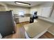 Well-equipped kitchen with white cabinets, modern appliances, and durable countertops at 302 Silver Fox Trail, Myrtle Beach, SC 29588