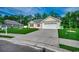 Attractive single-story home with a two-car garage, manicured lawn, and paved driveway at 3129 Slade Dr., Conway, SC 29526