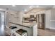 Modern kitchen with granite countertops, stainless steel appliances, and island seating at 3129 Slade Dr., Conway, SC 29526