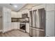 Bright kitchen with white cabinets, stainless steel appliances, and ample counter space at 3129 Slade Dr., Conway, SC 29526