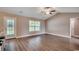 Inviting living room featuring wood floors, large window, and access to backyard at 3129 Slade Dr., Conway, SC 29526