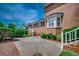 Brick exterior with well-maintained landscaping and a concrete patio at 3334 Cedar Creek Run, Little River, SC 29566