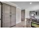 This kitchen boasts stainless appliances and ample cabinet space, seamlessly connecting to other living areas at 3334 Cedar Creek Run, Little River, SC 29566