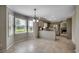 Bright kitchen and dining area with stainless steel appliances and beautiful natural light at 3334 Cedar Creek Run, Little River, SC 29566
