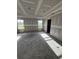 Bedroom under construction, features lots of natural light through its multiple windows at 3444 Asbury Rd., Aynor, SC 29511