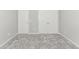 Bedroom with neutral carpeting and two closets with double doors each at 3539 Harrelson Ave., Loris, SC 29569